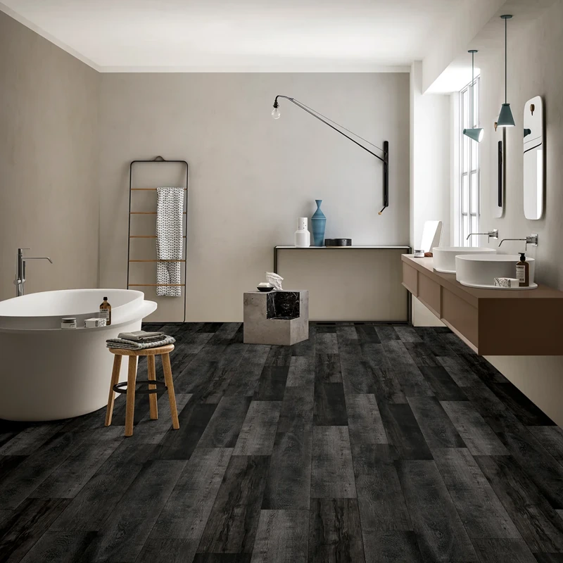 Charcoal black wood-plank flooring in luxury bathroom