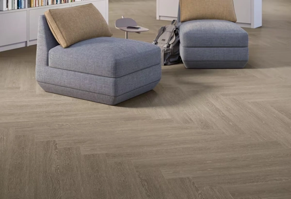 Modern lounge with herringbone wood flooring