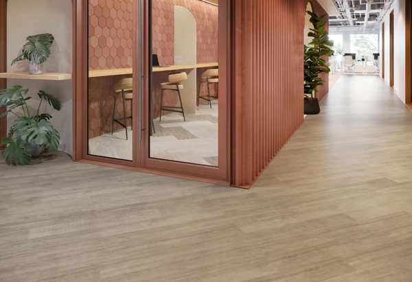 Modern office hallway with wood-look vinyl flooring