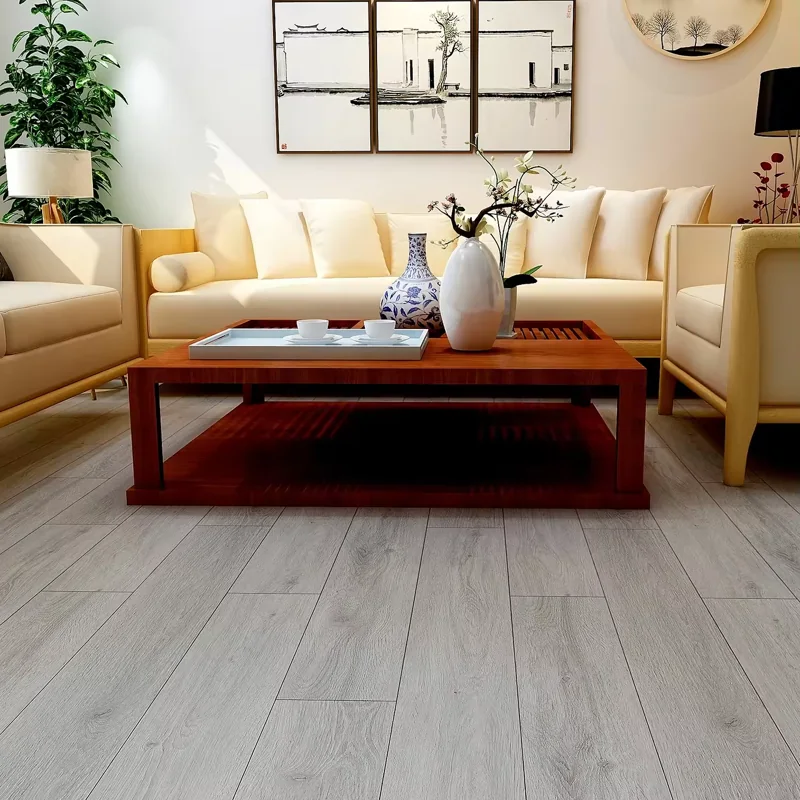 Warm living room featuring light grey wood laminate floors